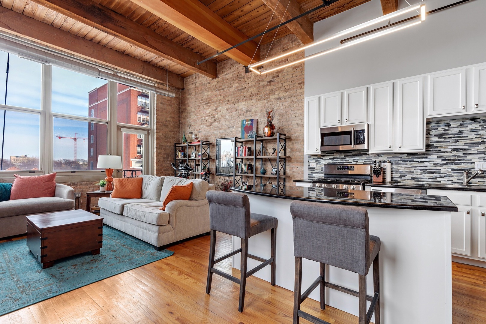 1500 West Monroe Street, Unit 401 Chicago, IL 60607 - Photo 13 of 24 a living room with stainless steel appliances granite countertop lots of counter top space