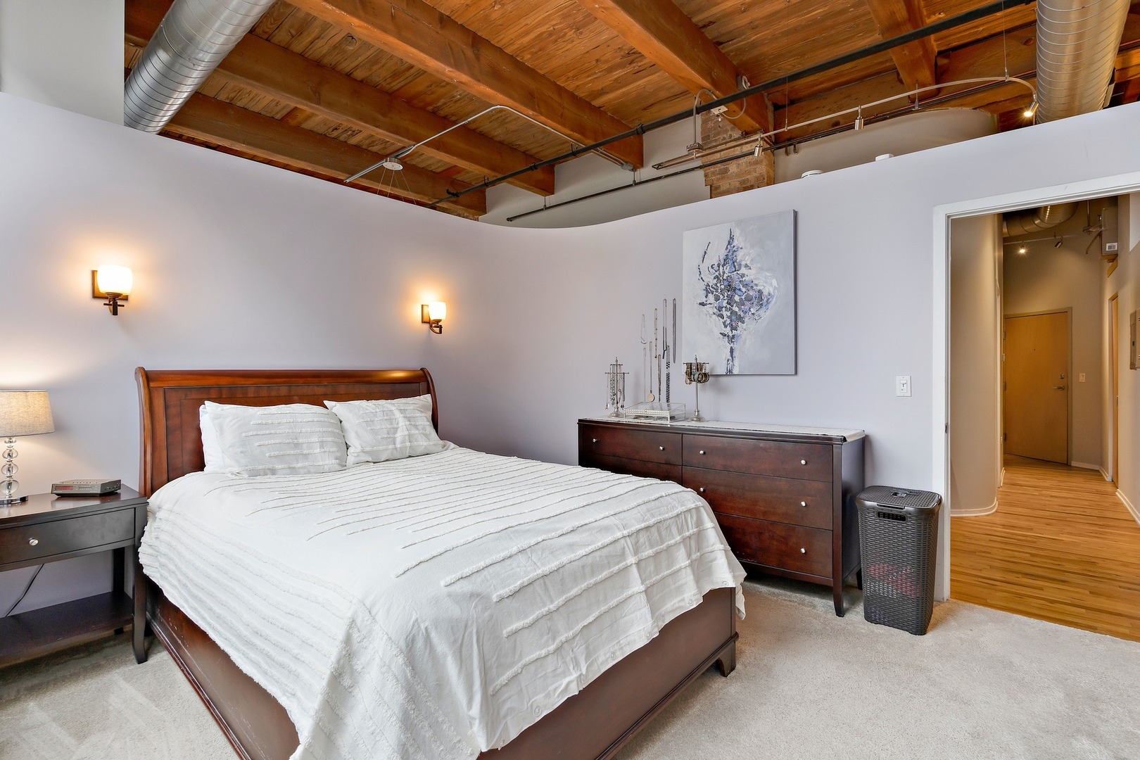 1500 West Monroe Street, Unit 401 Chicago, IL 60607 - Photo 17 of 24 a bedroom with a bed and a desk