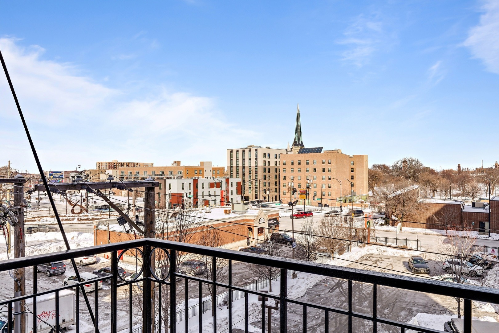 1500 West Monroe Street, Unit 401 Chicago, IL 60607 - Photo 24 of 24 a view of a city from a balcony