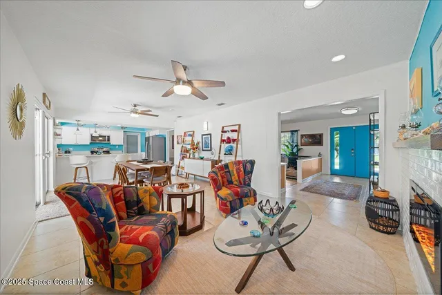 a bed room with a bed window and a chair