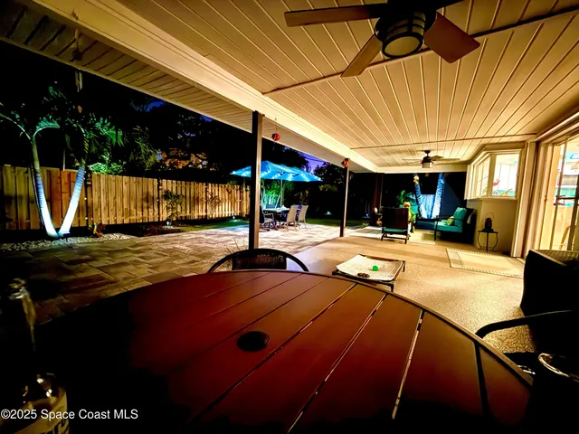 an aerial view of a house with a garden