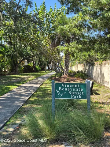 a view of a backyard with green space