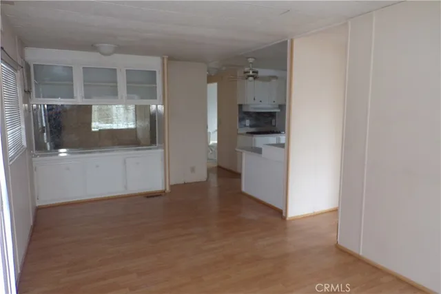 a view of a kitchen with a sink and an oven