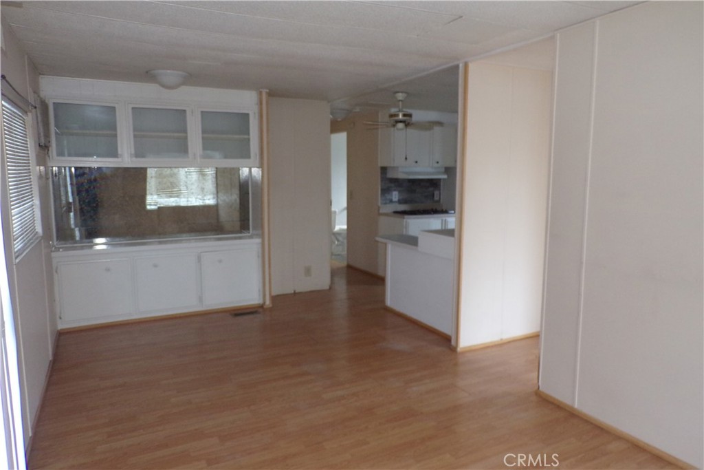 12710 3rd Street, Unit SPC 64 Yucaipa, CA 92399 - Photo 3 of 11 a view of a kitchen with a sink and an oven