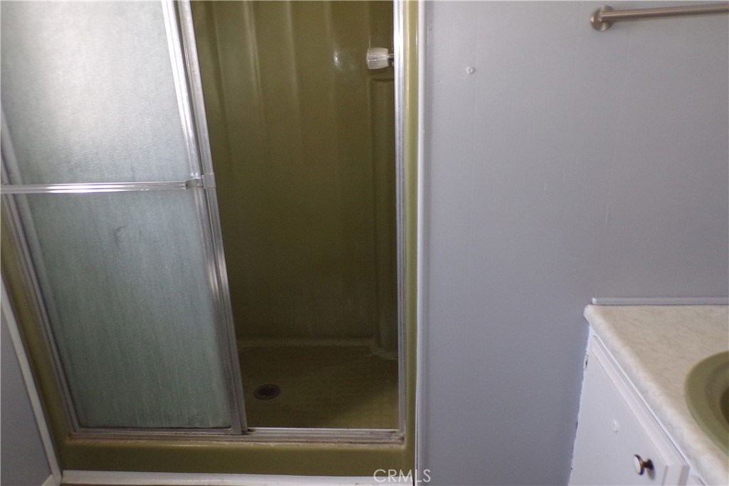 12710 3rd Street, Unit SPC 64 Yucaipa, CA 92399 - Photo 6 of 11 a bathroom with a shower