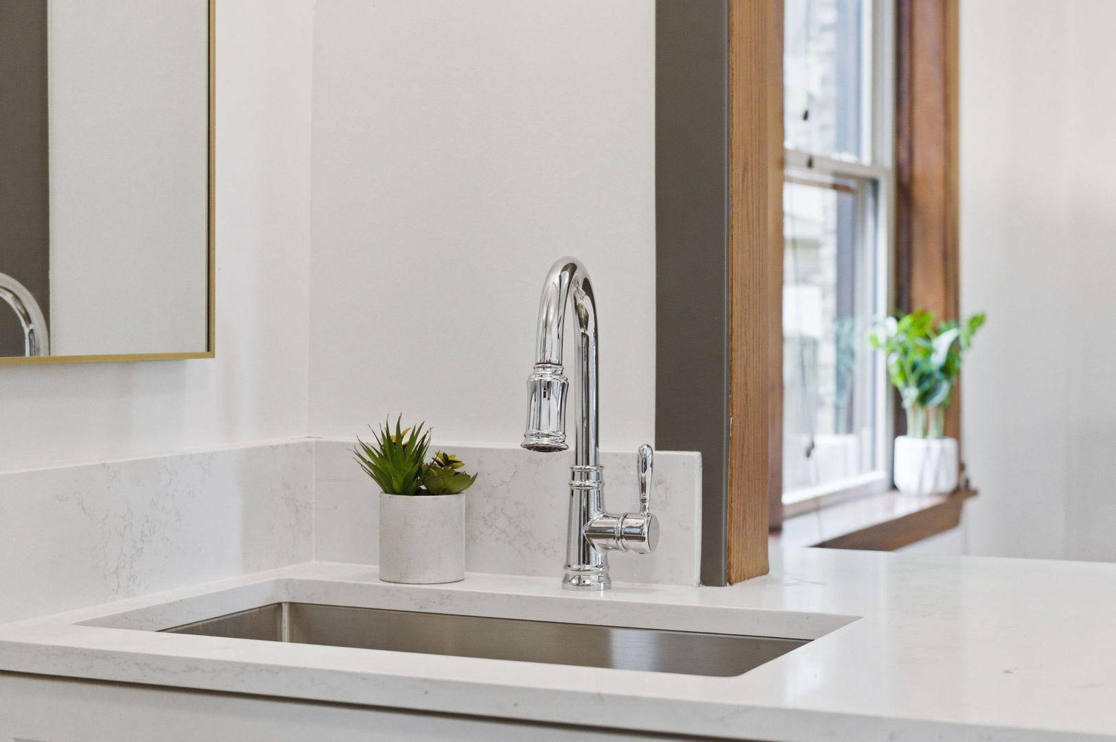 2920 West Altgeld Street, Unit 2 Chicago, IL 60647 - Photo 13 of 22 a bathroom with a potted plant