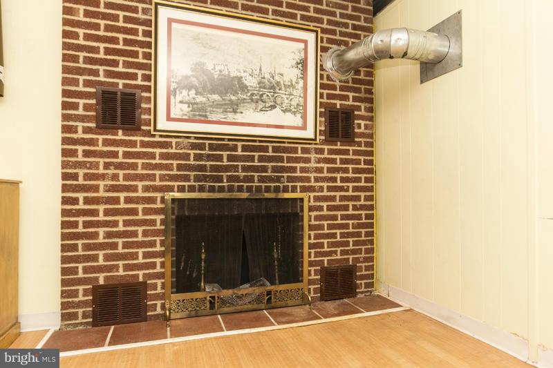 9413 Old Harford Road Baltimore, MD 21234 - Photo 28 of 30 Lower Level wood burning Fireplace