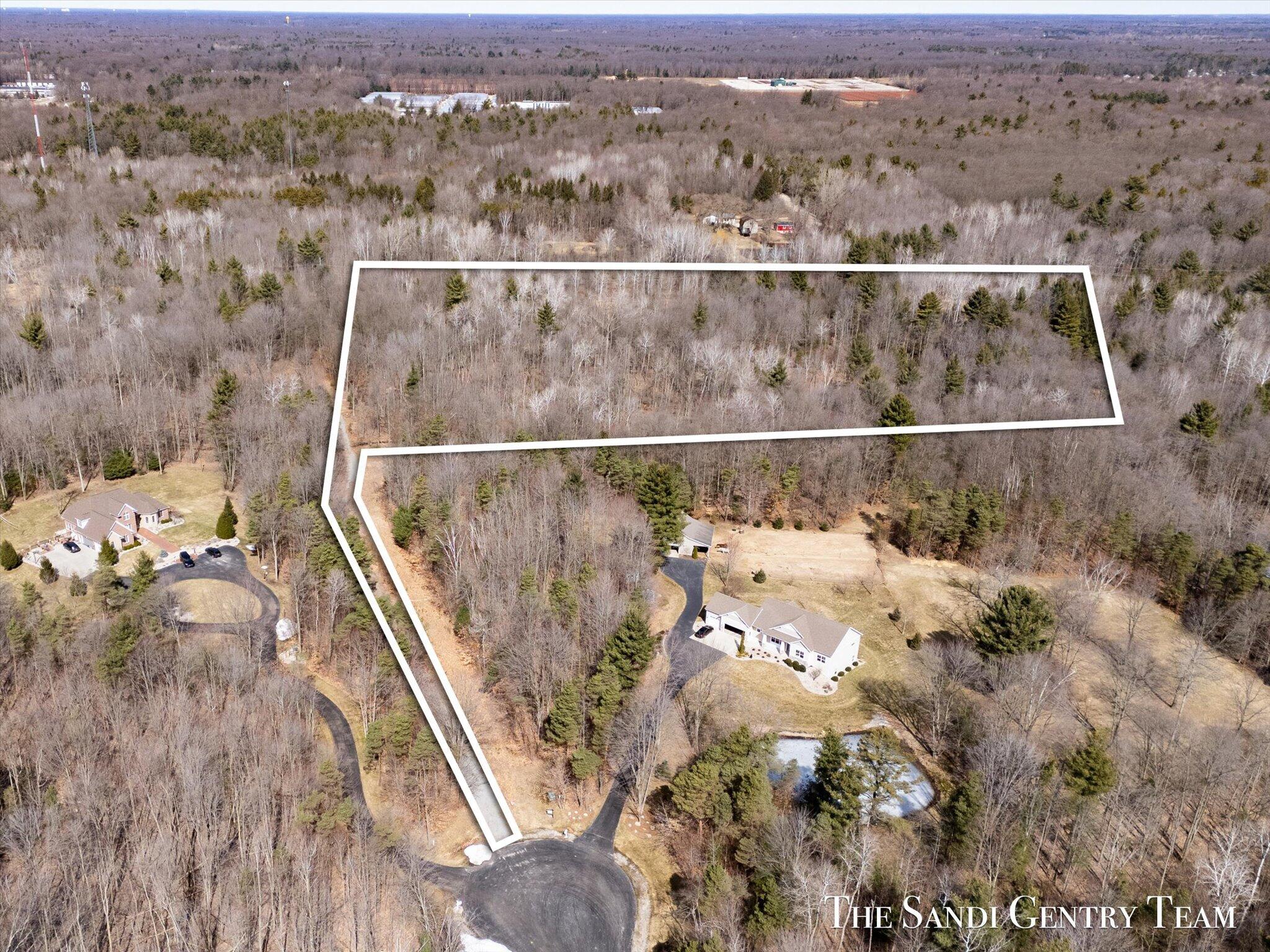 16400 Longleaf Lane Spring Lake, MI 49456 - Photo 1 of 13 01-DJI_20250312133636_0523_D-Edit-Edit