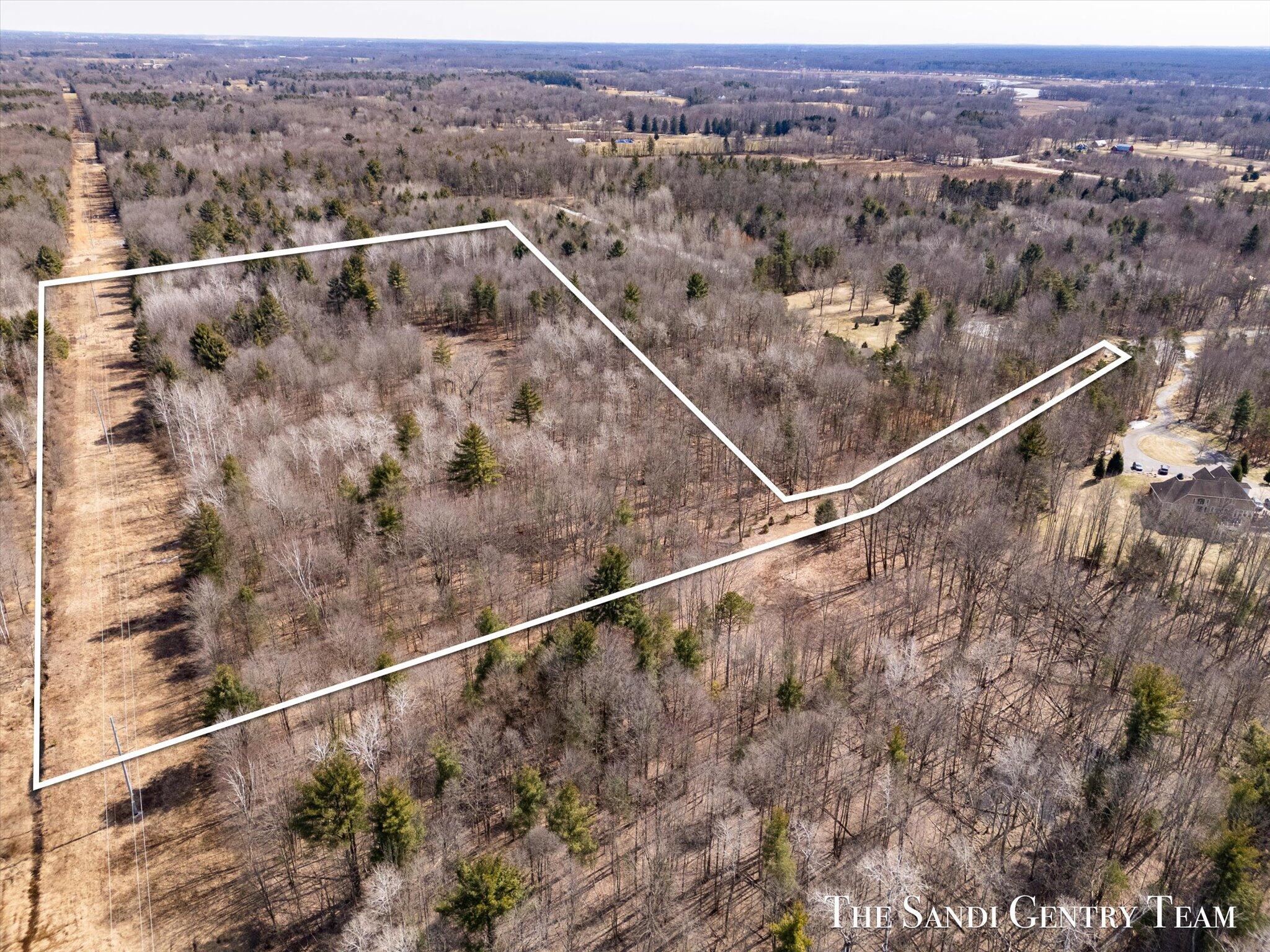16400 Longleaf Lane Spring Lake, MI 49456 - Photo 3 of 13 03-DJI_20250312133203_0496_D