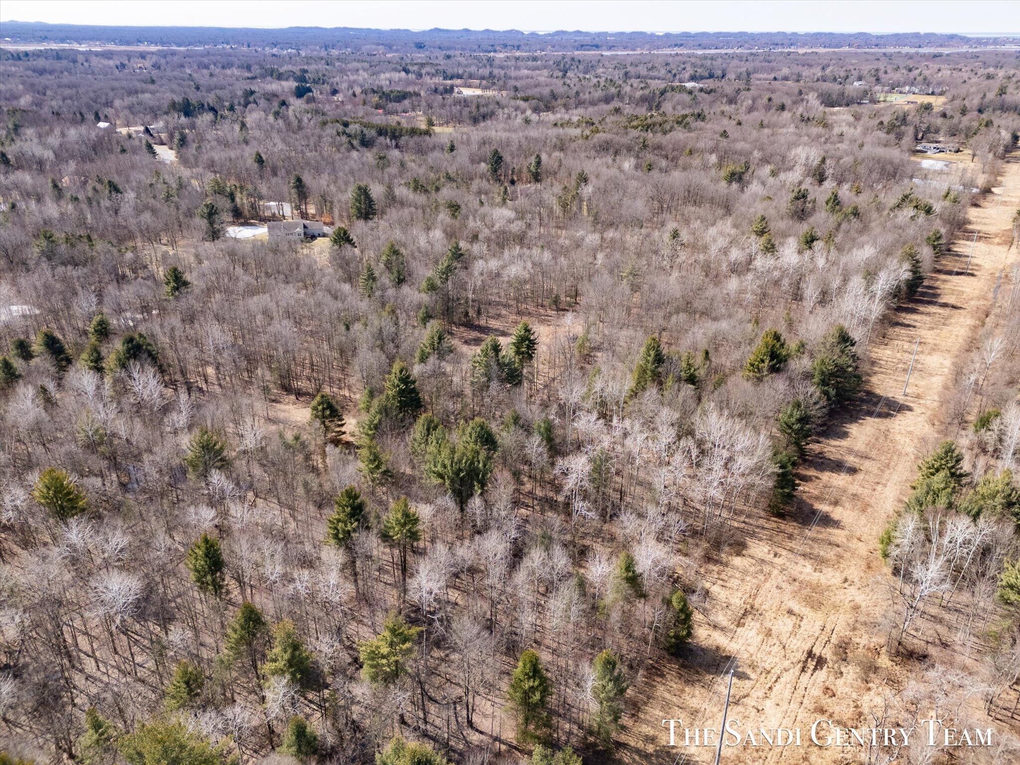 16400 Longleaf Lane Spring Lake, MI 49456 - Photo 8 of 13 08-DJI_20250312133341_0505_D