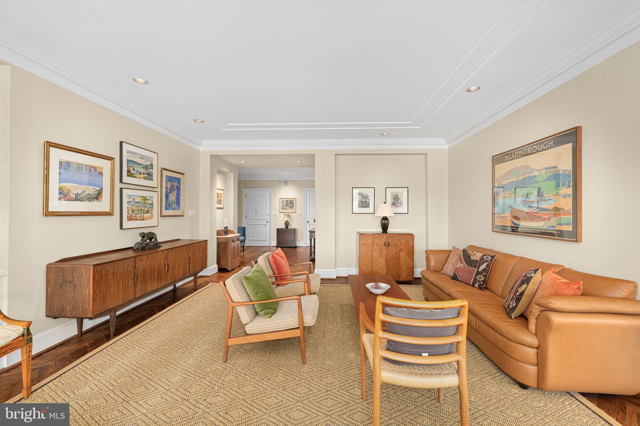 2700 Calvert Street Northwest, Unit 817 Washington, DC 20008 - Photo 12 of 64 a living room with furniture and a couch