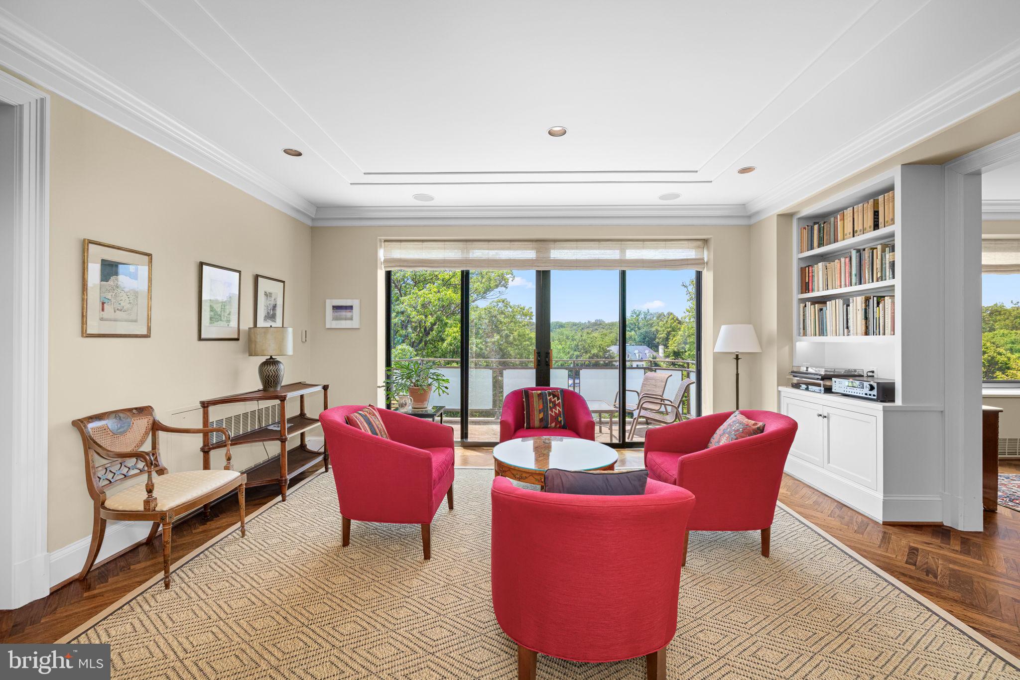 2700 Calvert Street Northwest, Unit 817 Washington, DC 20008 - Photo 15 of 64 a living room with furniture and a floor to ceiling window