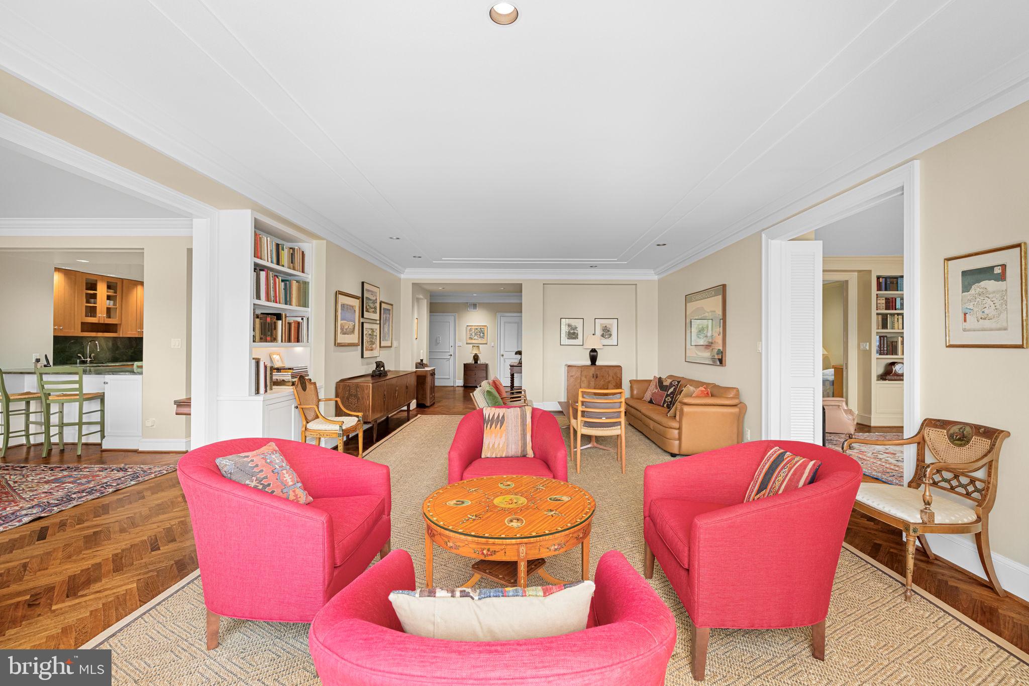 2700 Calvert Street Northwest, Unit 817 Washington, DC 20008 - Photo 28 of 64 a living room with furniture and wooden floor