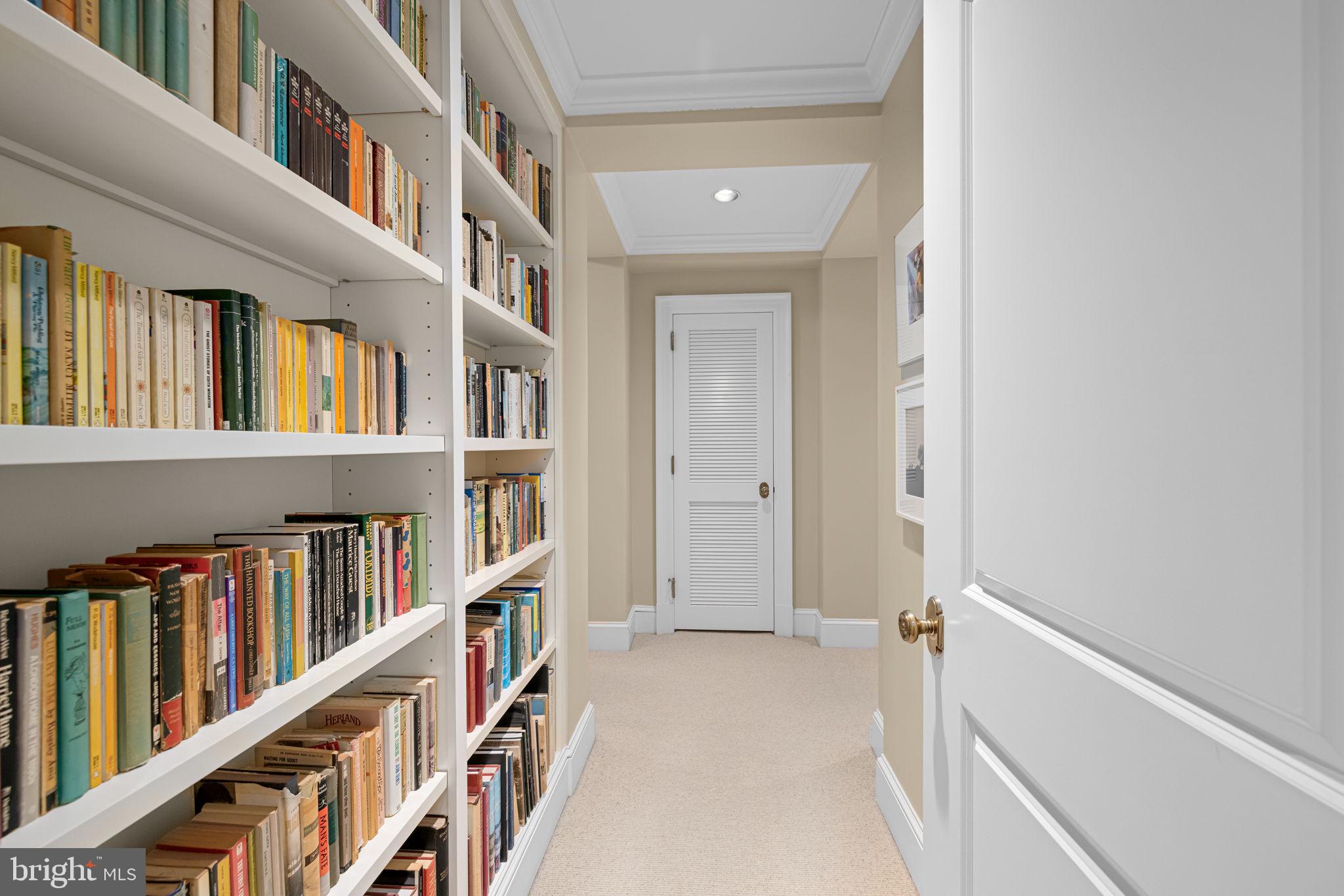 2700 Calvert Street Northwest, Unit 817 Washington, DC 20008 - Photo 35 of 64 a view of an entryway with lots of books