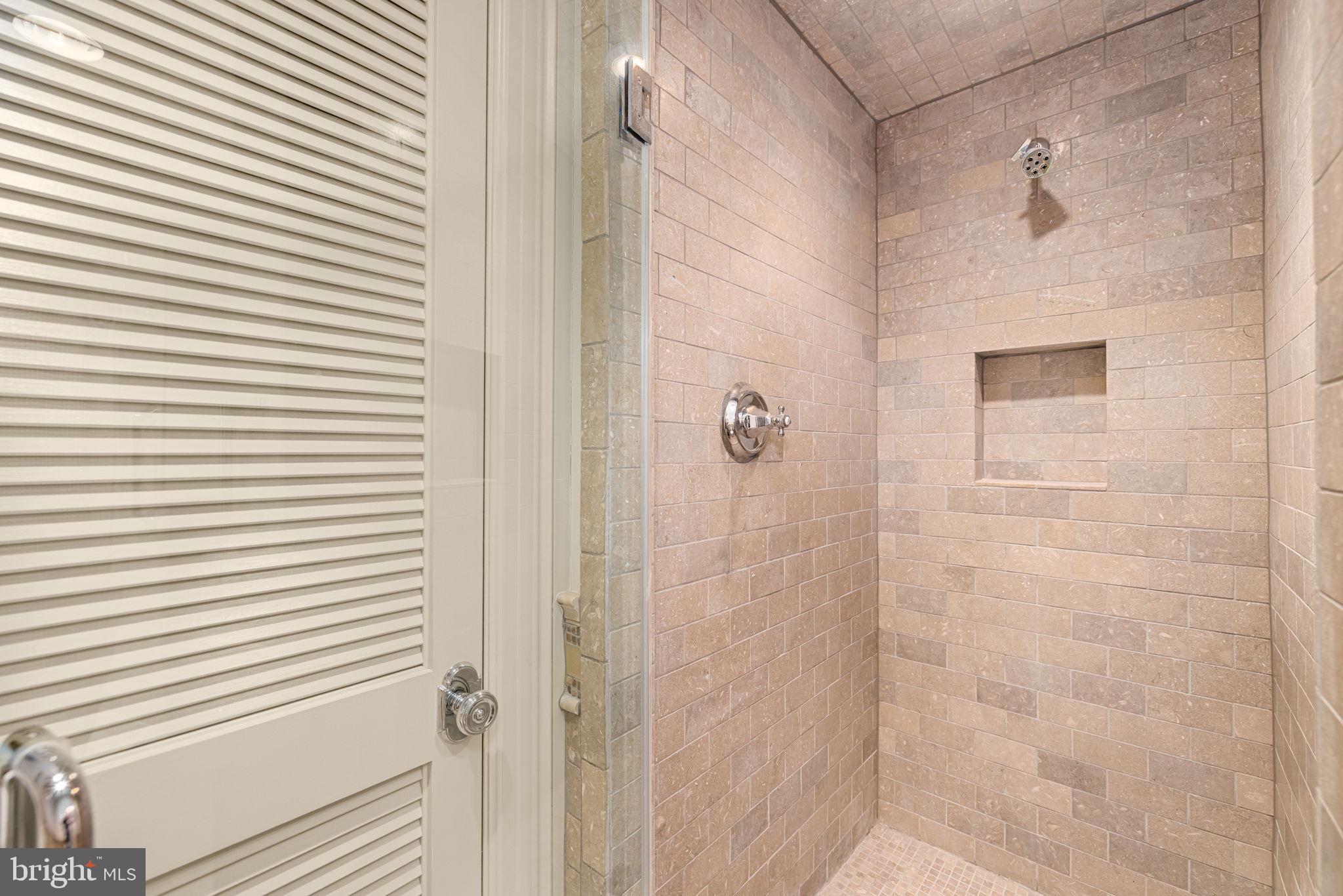 2700 Calvert Street Northwest, Unit 817 Washington, DC 20008 - Photo 45 of 64 a bathroom with a shower