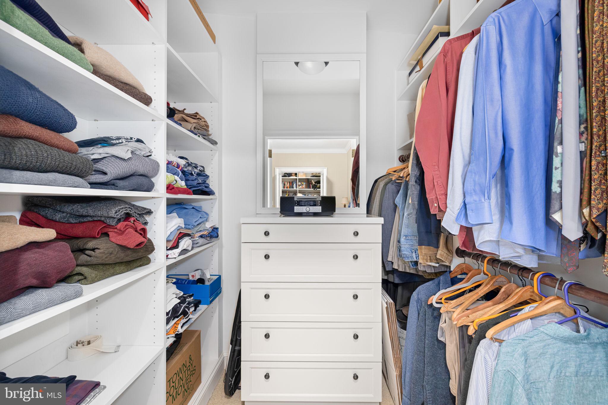 2700 Calvert Street Northwest, Unit 817 Washington, DC 20008 - Photo 47 of 64 a view of walk in closet with clothes and shoes