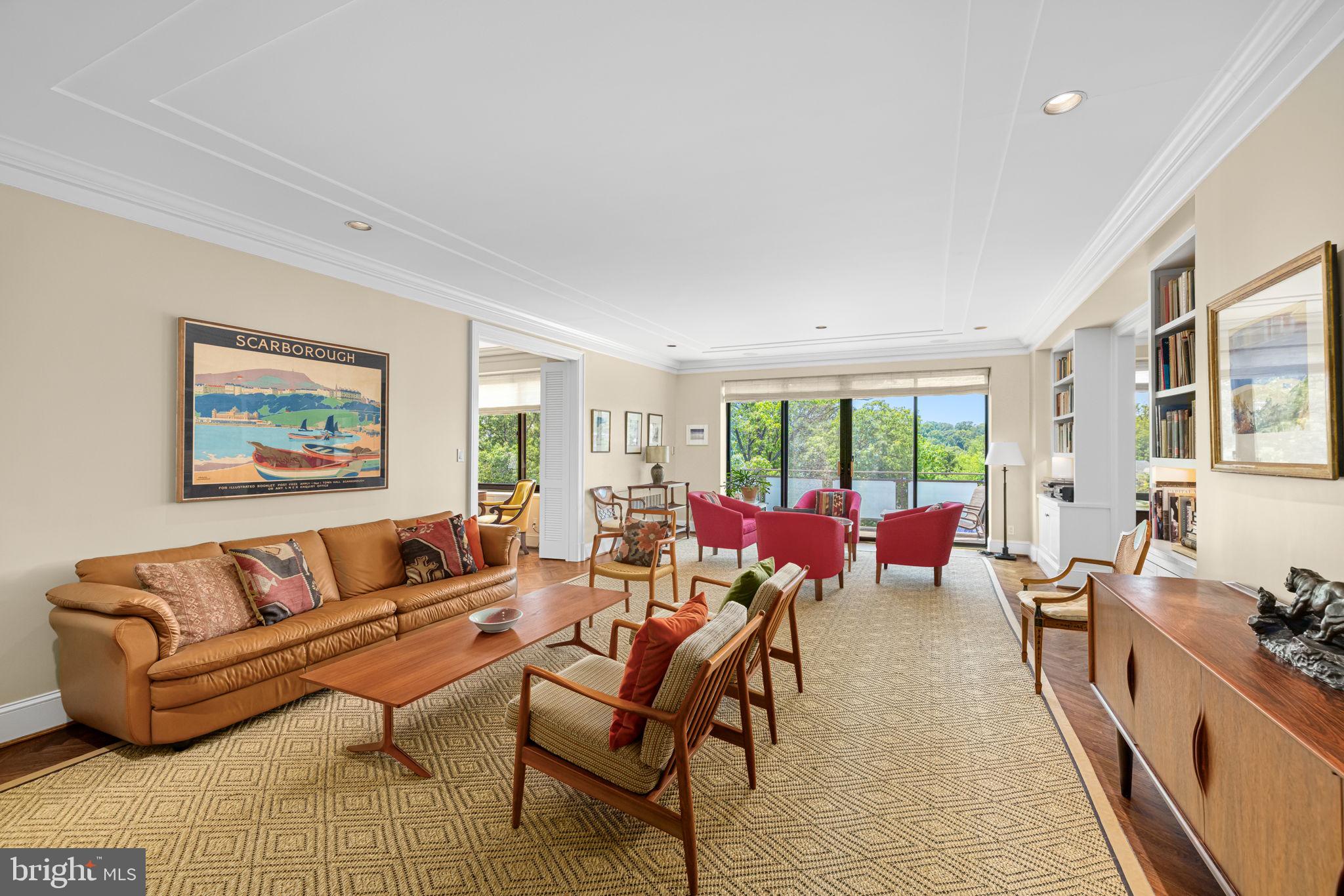 2700 Calvert Street Northwest, Unit 817 Washington, DC 20008 - Photo 8 of 64 a living room with furniture or couch and a large window