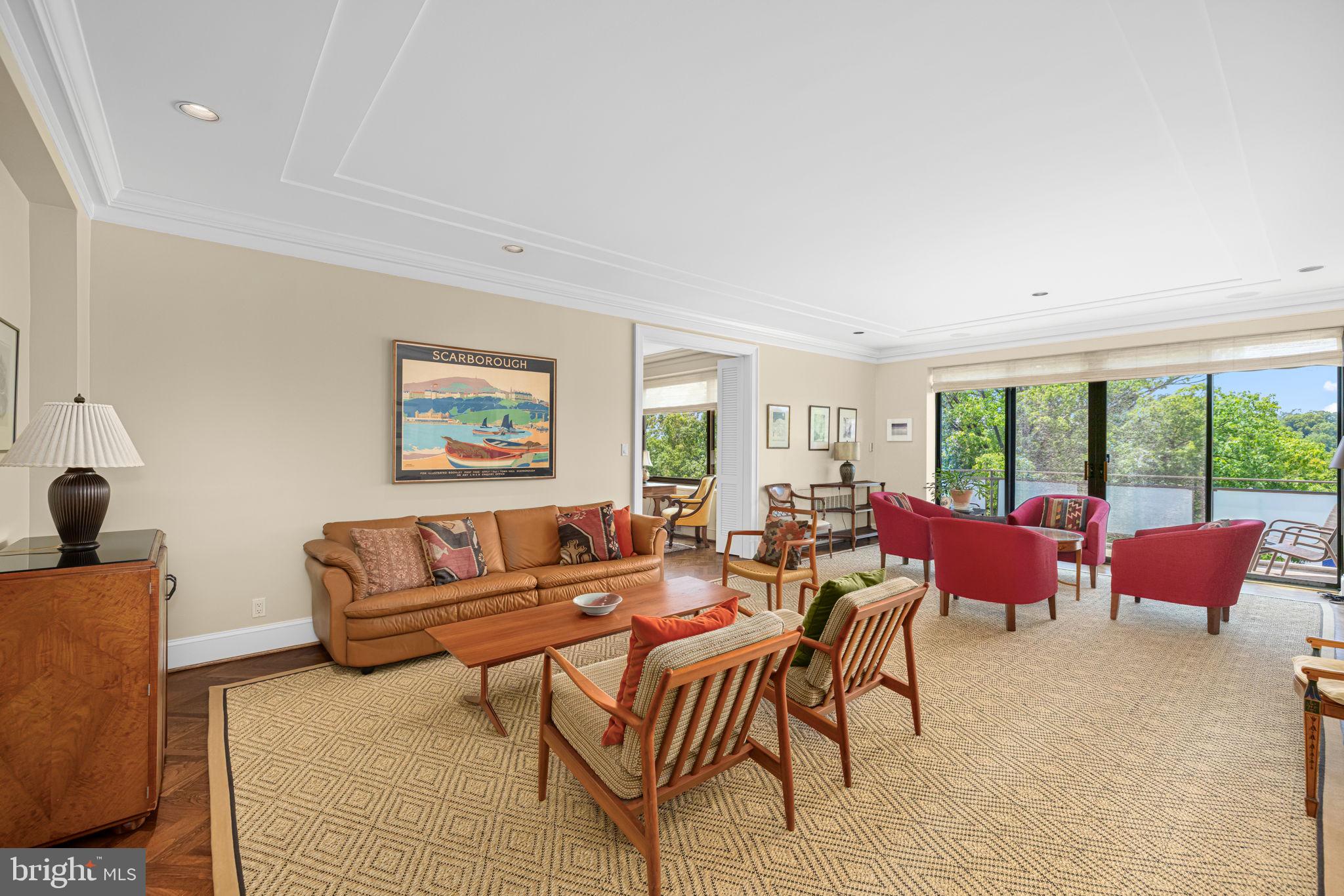 2700 Calvert Street Northwest, Unit 817 Washington, DC 20008 - Photo 9 of 64 a living room with furniture and a large window