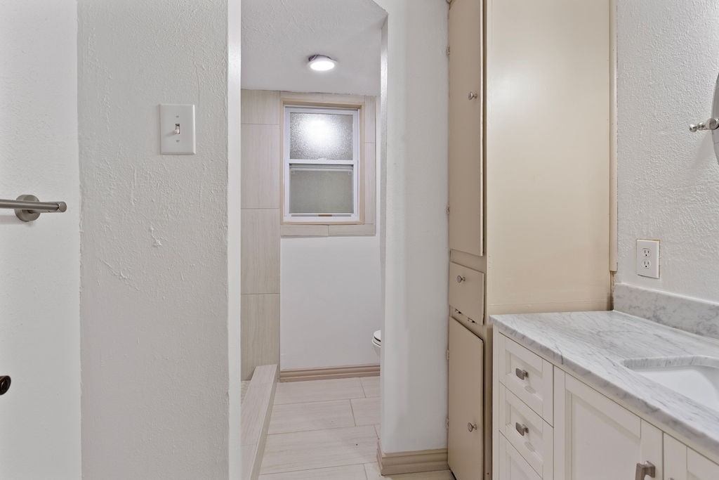 15050 Cardinal Trail Conroe, TX 77302 - Photo 18 of 44 a view of a bathroom from the hallway