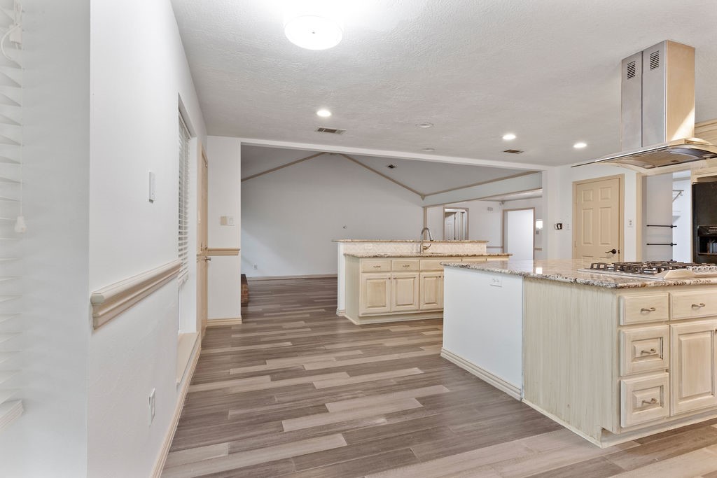 15050 Cardinal Trail Conroe, TX 77302 - Photo 35 of 44 a view of kitchen with wooden floor and electronic appliances