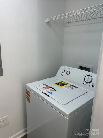 a utility room with washer and dryer
