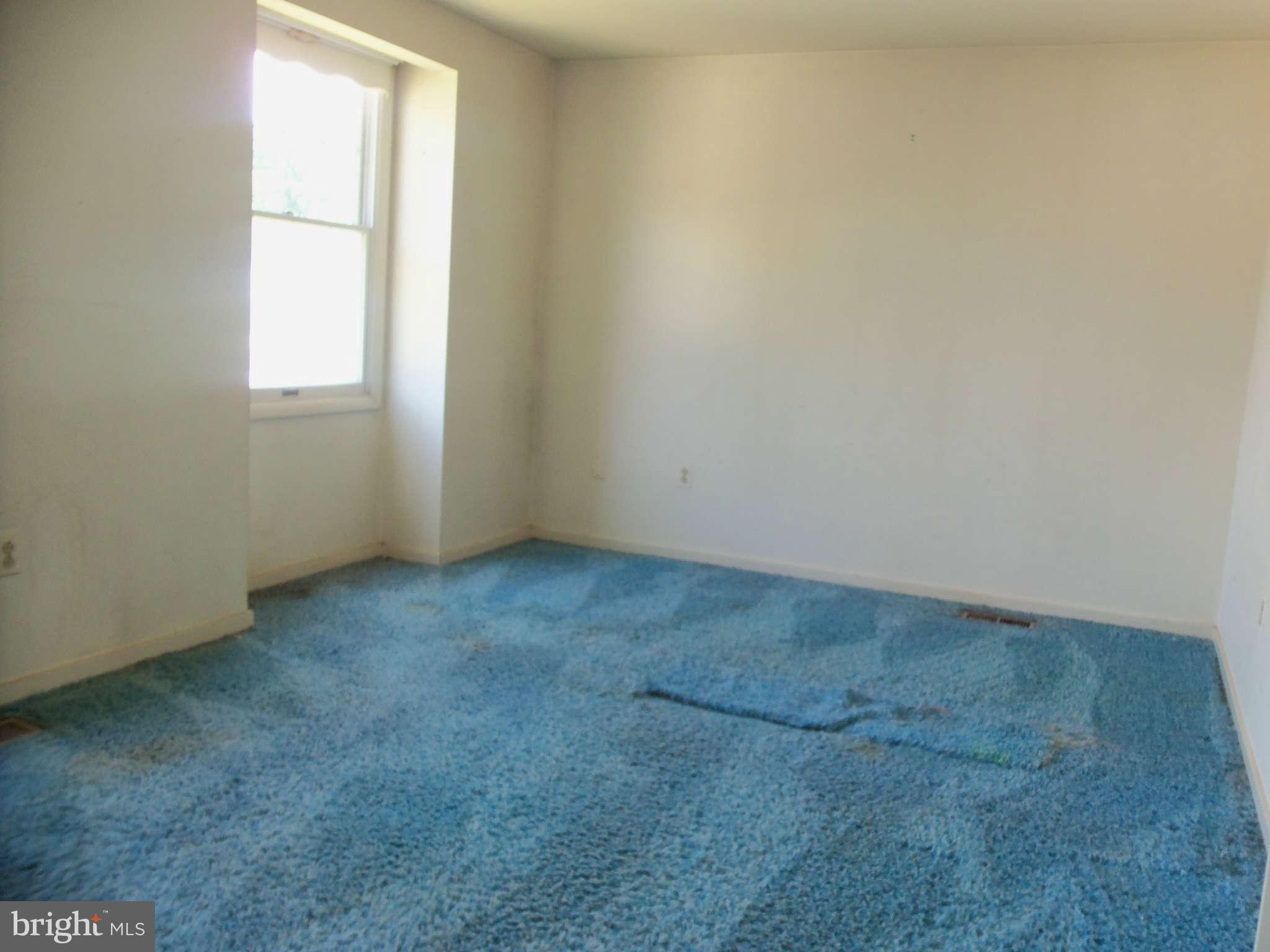 9619 Winands Road Randallstown, MD 21133 - Photo 12 of 20 an empty room with a window