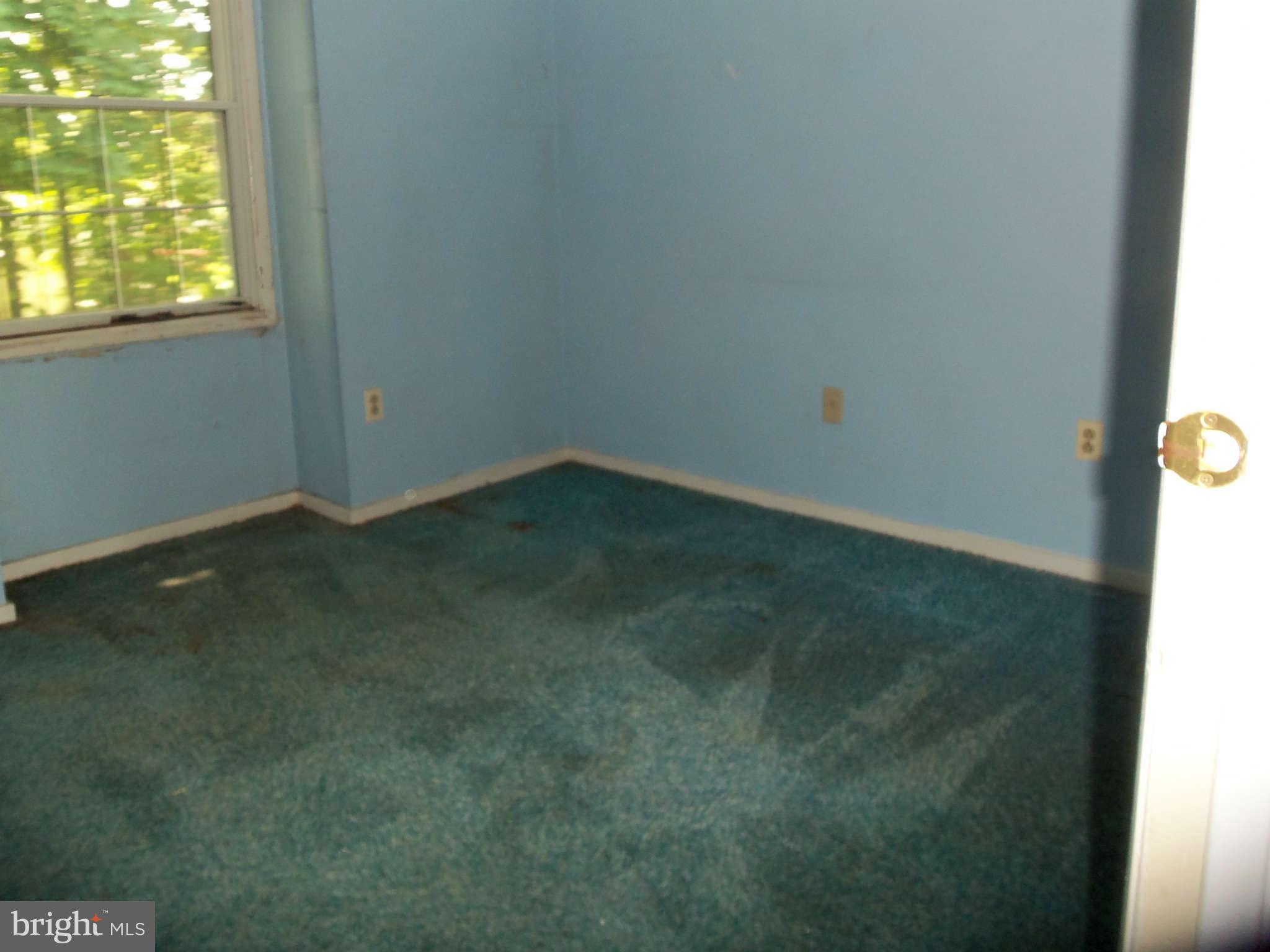 9619 Winands Road Randallstown, MD 21133 - Photo 13 of 20 an empty room with a window