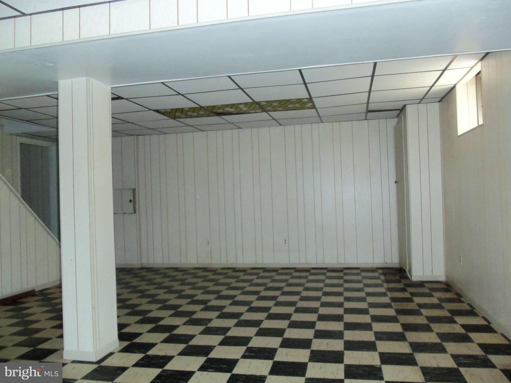 9619 Winands Road Randallstown, MD 21133 - Photo 16 of 20 a black and white checkered floor