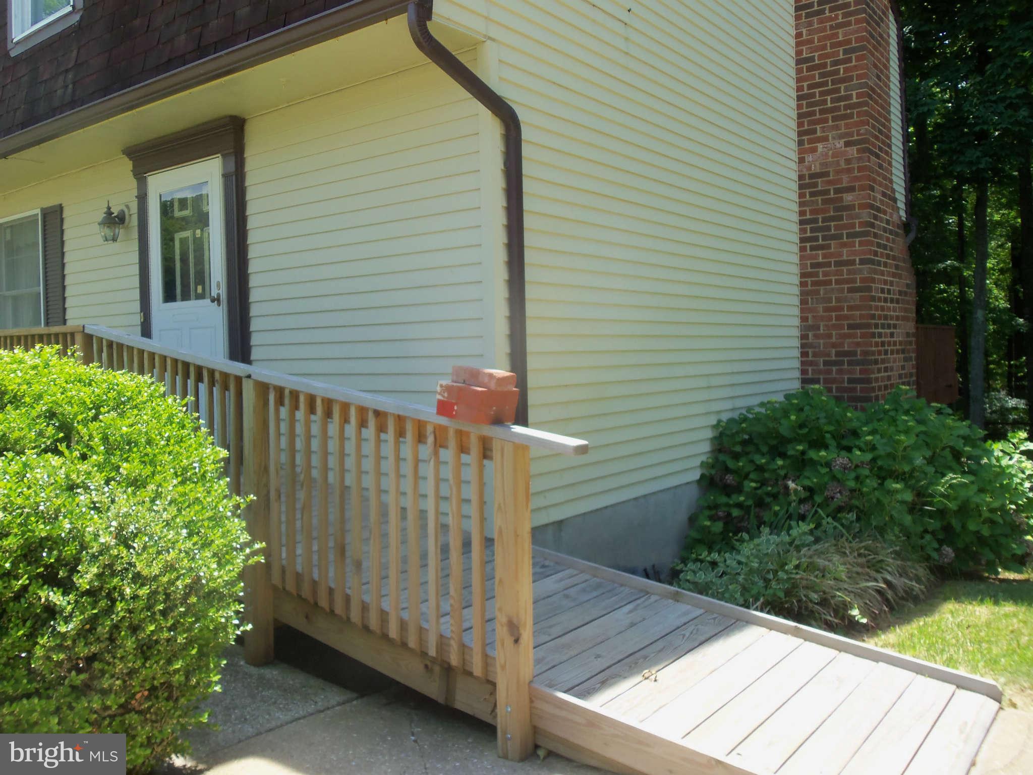 9619 Winands Road Randallstown, MD 21133 - Photo 18 of 20 a view of a house with a small yard
