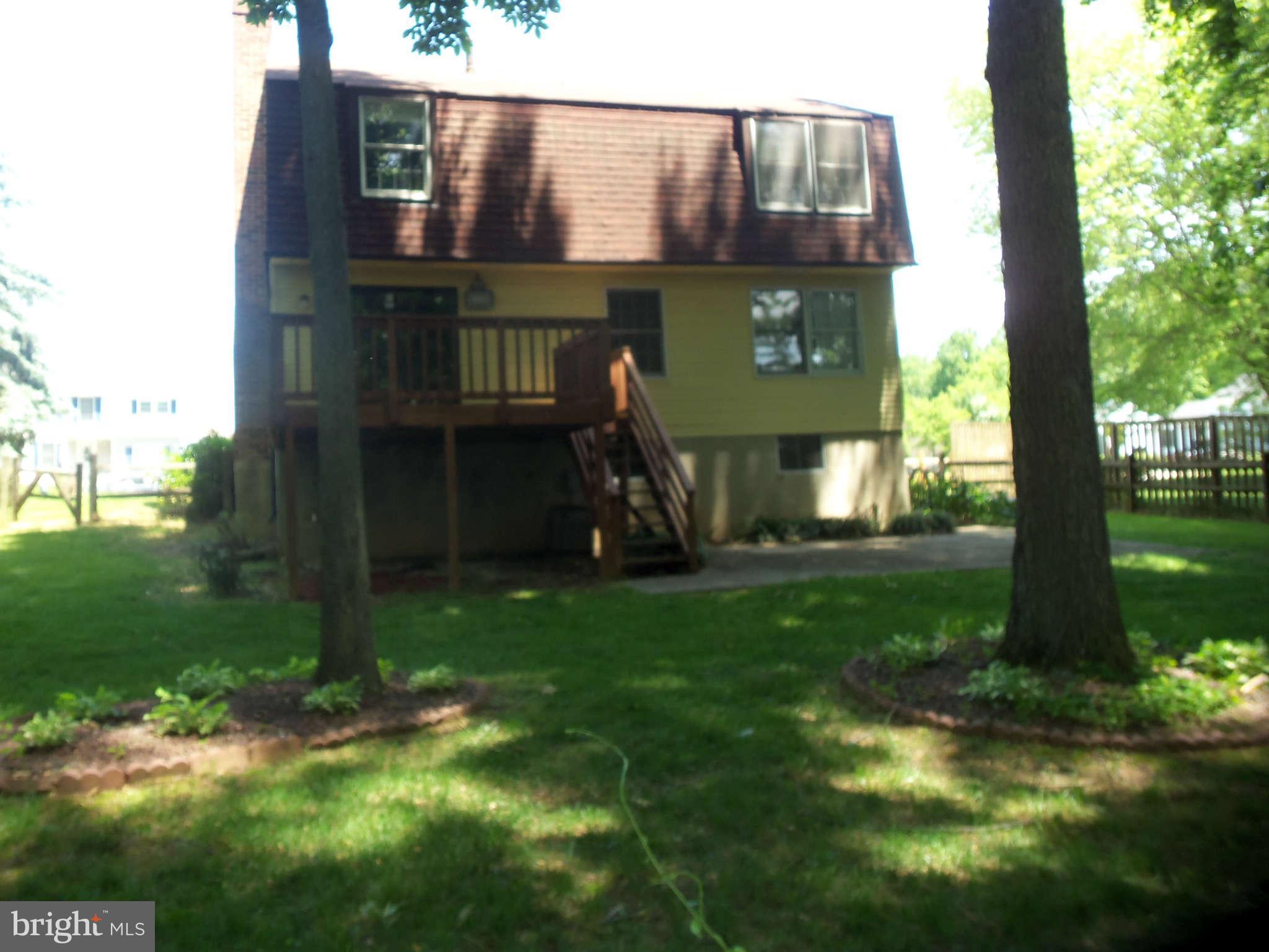 9619 Winands Road Randallstown, MD 21133 - Photo 20 of 20 a front view of a house with garden