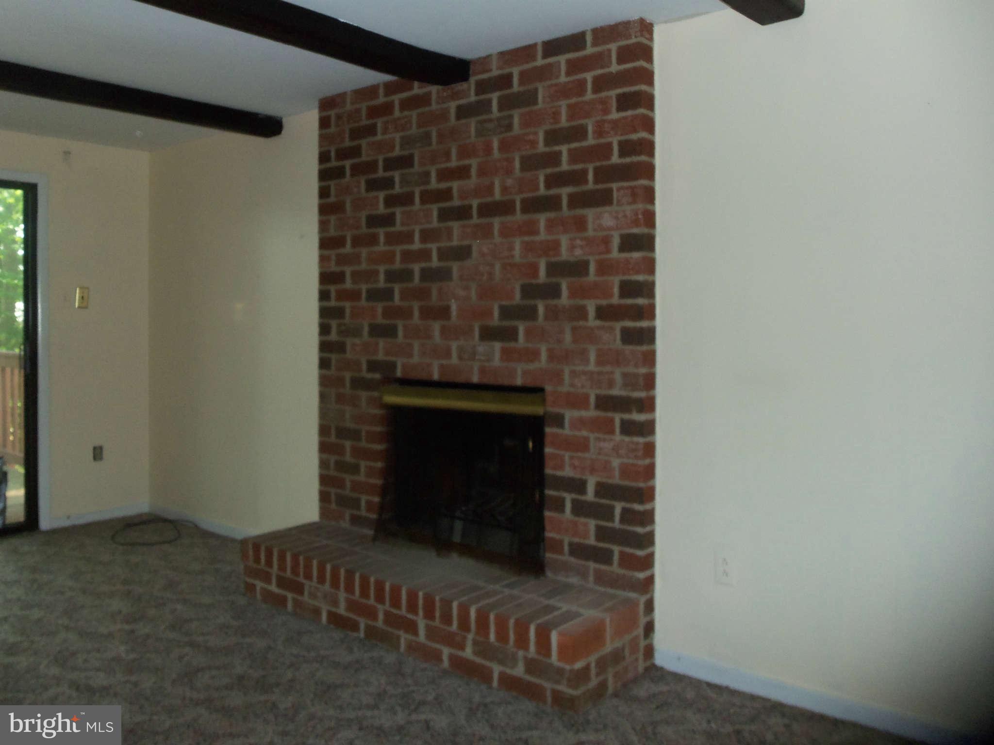 9619 Winands Road Randallstown, MD 21133 - Photo 5 of 20 a room with a fireplace