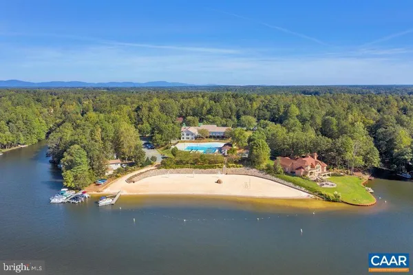 a view of a swimming pool with an outdoor space and seating area