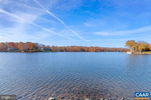 a view of lake with mountain in the background