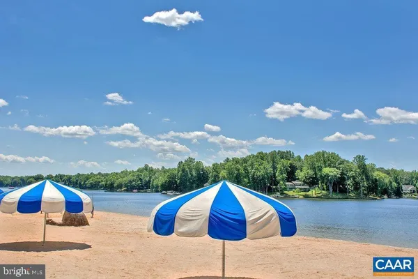 a view of swimming pool outdoor seating