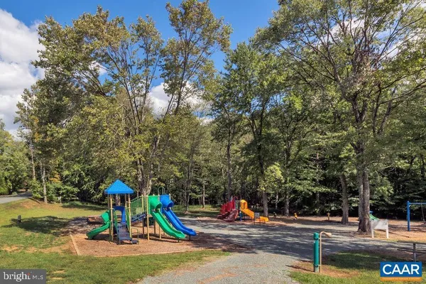 a view of a park with swings