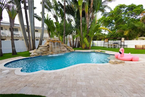 a view of a garden with an outdoor space