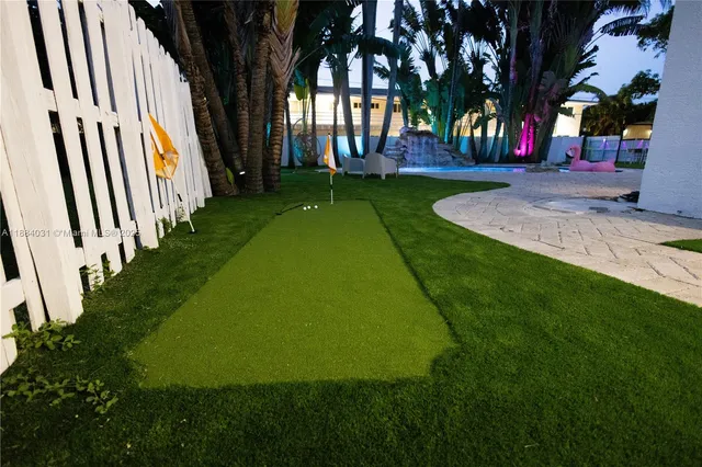 a view of a garden with an outdoor space