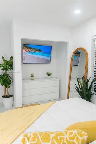 a bathroom with a tub and sink