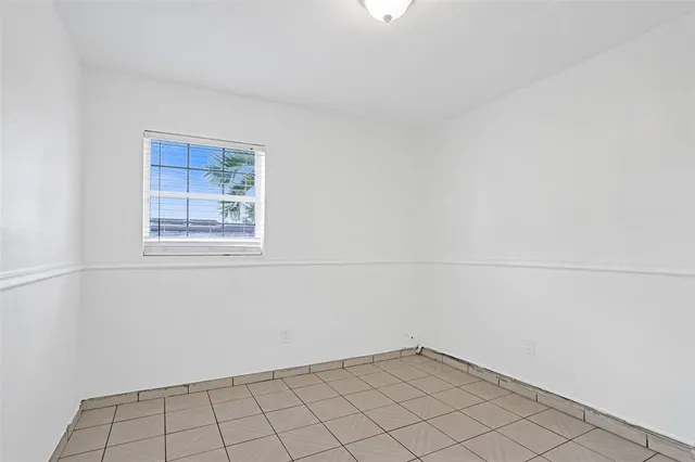 an empty room with cabinet