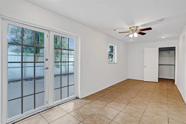 a view of an empty room with a window