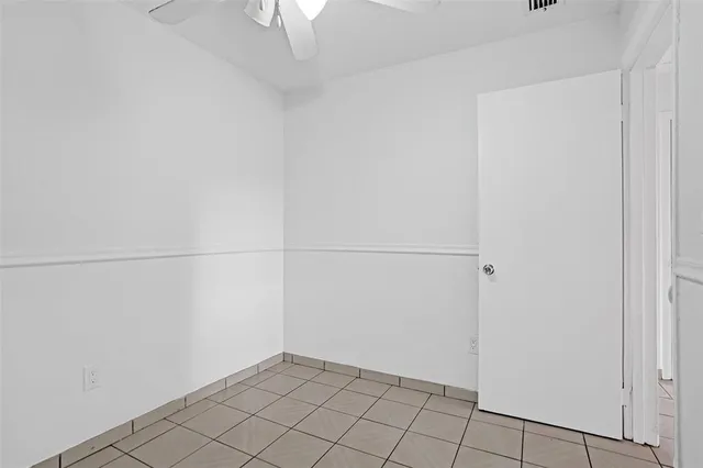 an empty room with white door