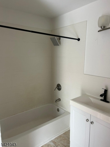 1210 Roselle Street Linden, NJ 07036 - Photo 13 of 15 a bathroom with a shower and a sink