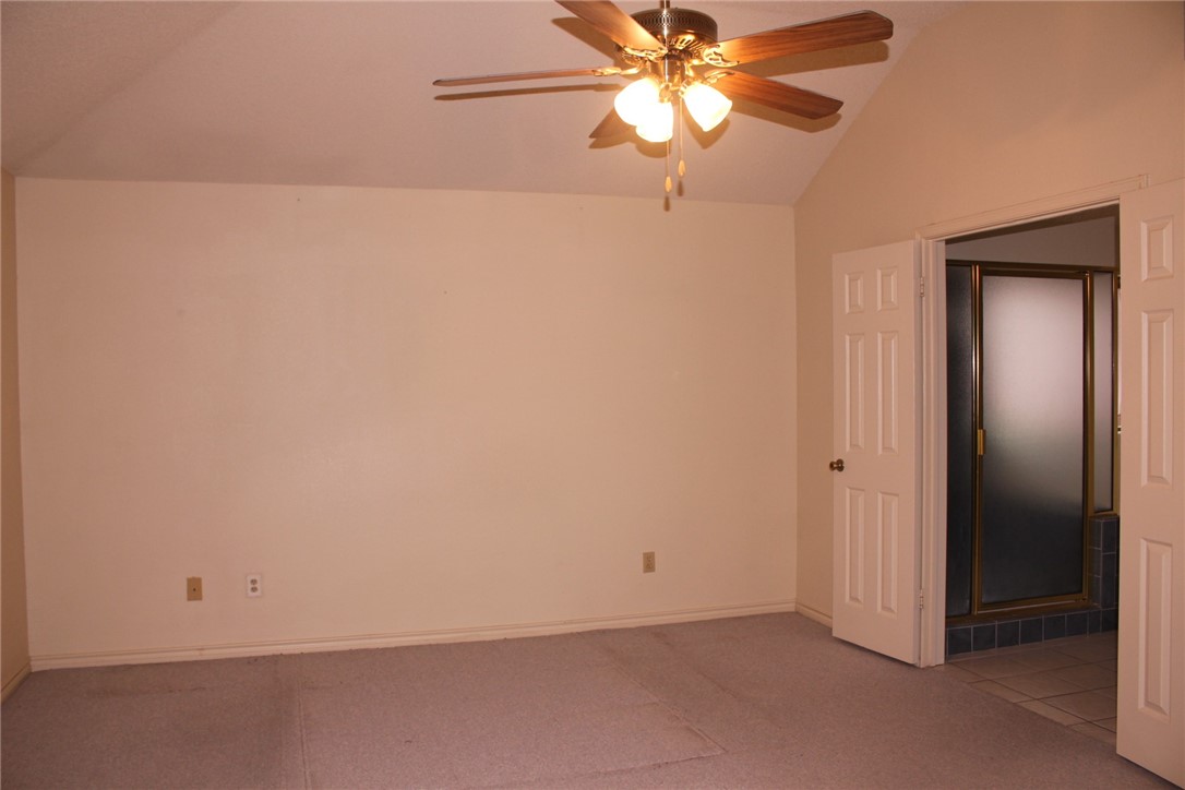 2141 Surrender Avenue Austin, TX 78728 - Photo 24 of 38 an empty room with a fan and a fan