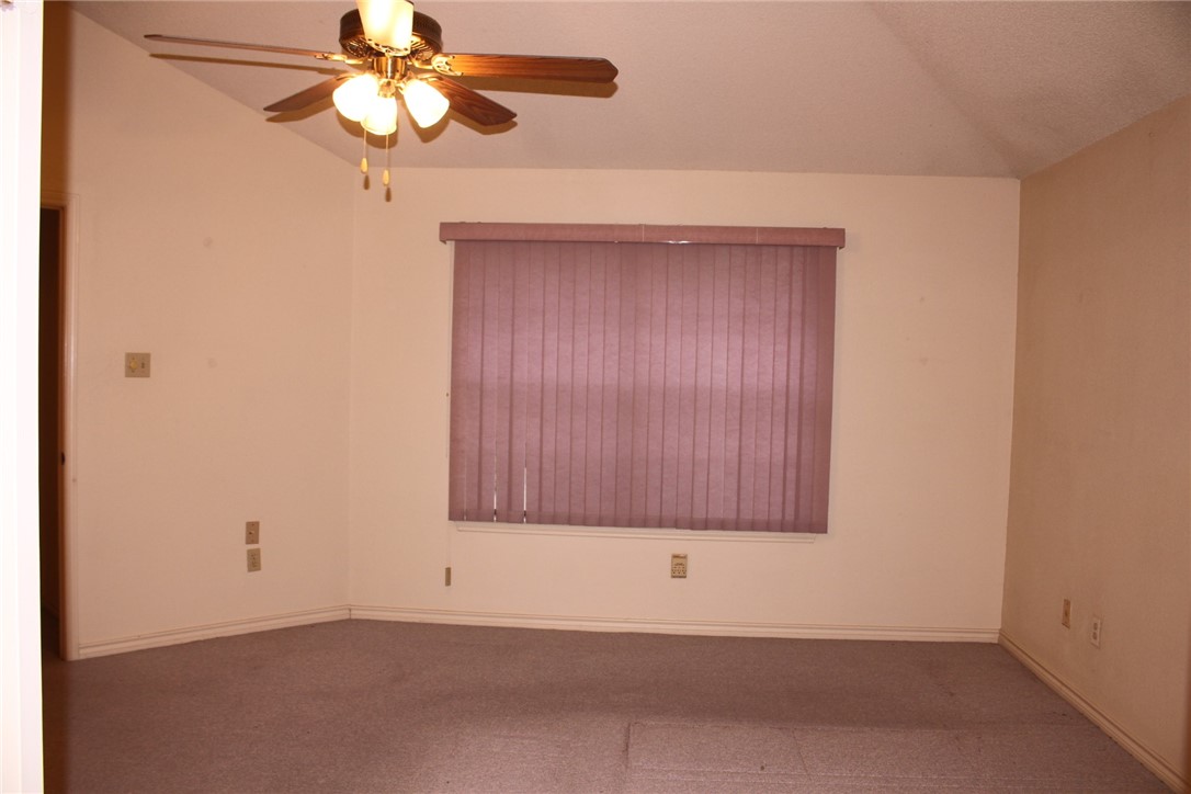 2141 Surrender Avenue Austin, TX 78728 - Photo 30 of 38 an empty room with windows and fan