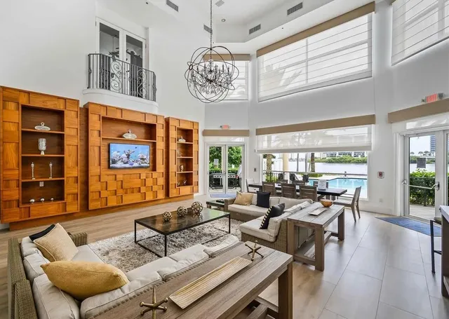 a large hall with a large pool table and chairs