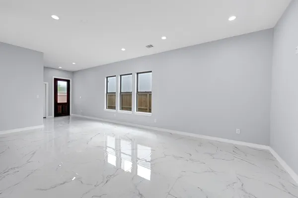 an empty room with windows