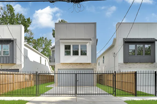 a view of a balcony with a potted plants