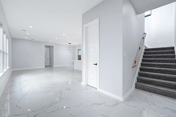 a view of an entryway with stairs