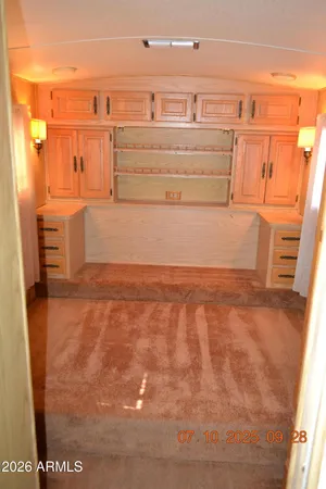 a bathroom with a shower and a sink