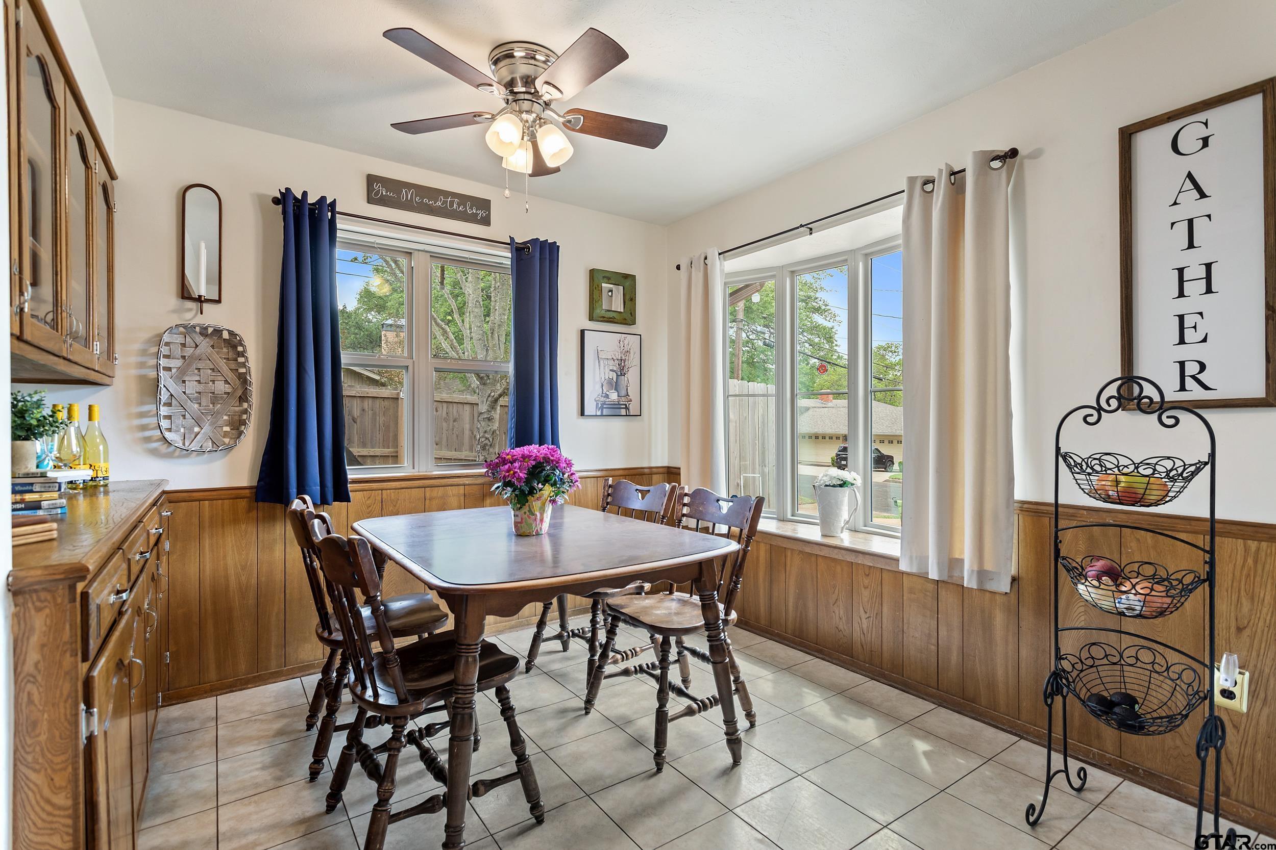516 Ruthlynn Drive Longview, TX 75605 - Photo 9 of 34 a view of a dining room with furniture window and outside view